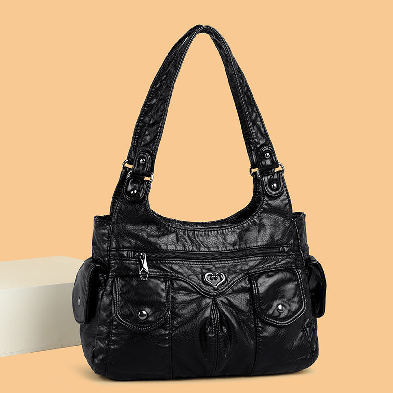 Bolsa de hombro femenina de diseño suave y funcional