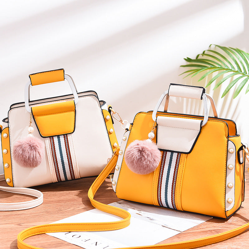 Bolso de mano con detalles modernos – Fiorella
