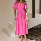 Kelly - Vestido estilo elegante con escote en V y mangas abullonadas