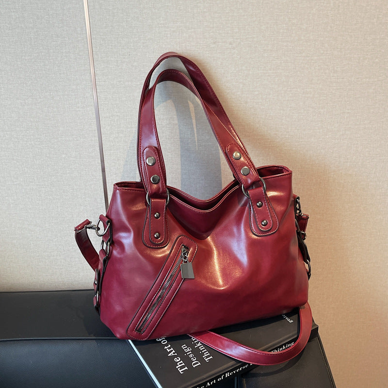 Bolsa de hombro femenina de estilo urbano