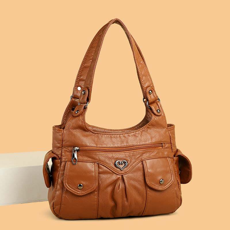 Bolsa de hombro femenina de diseño suave y funcional
