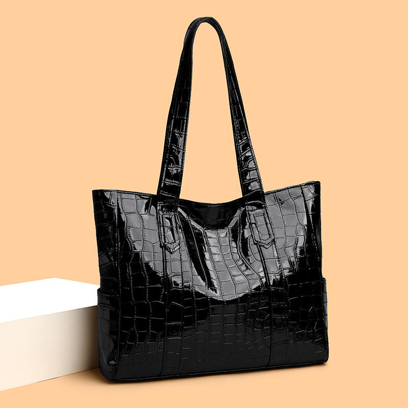 Bolsa tote femenina de acabado texturizado elegante