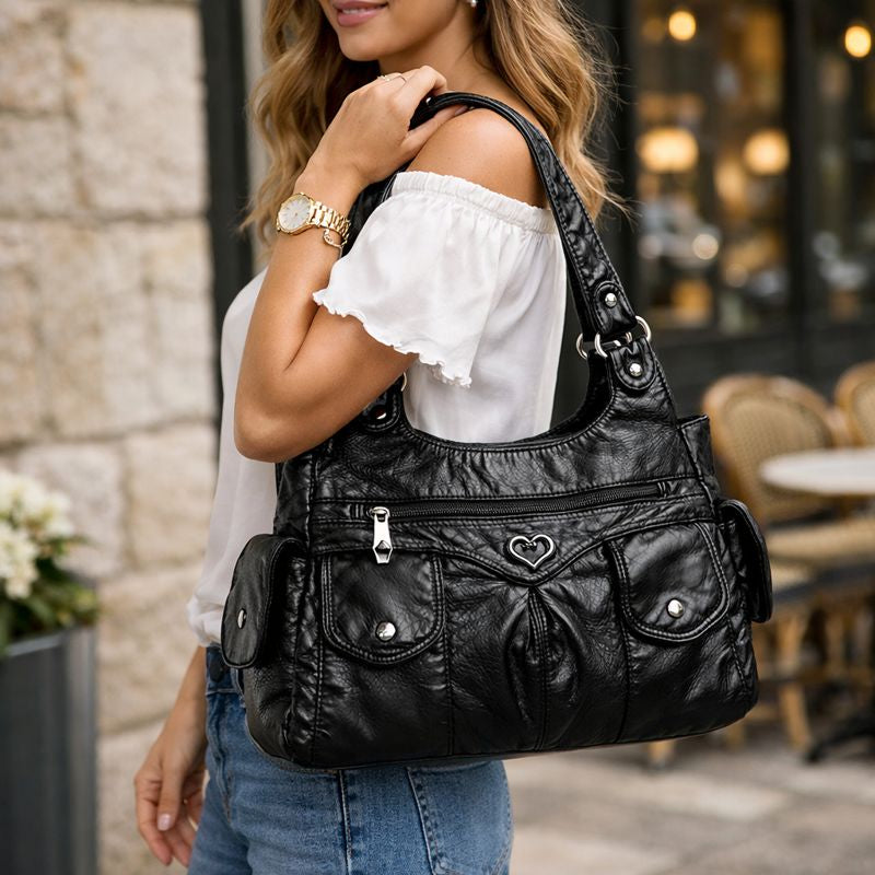 Bolsa de hombro femenina de diseño suave y funcional
