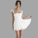 Evelina - Vestido con adornos de encaje y falda vaporosa