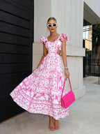 Sally - Vestido largo color rosa con estampado floral