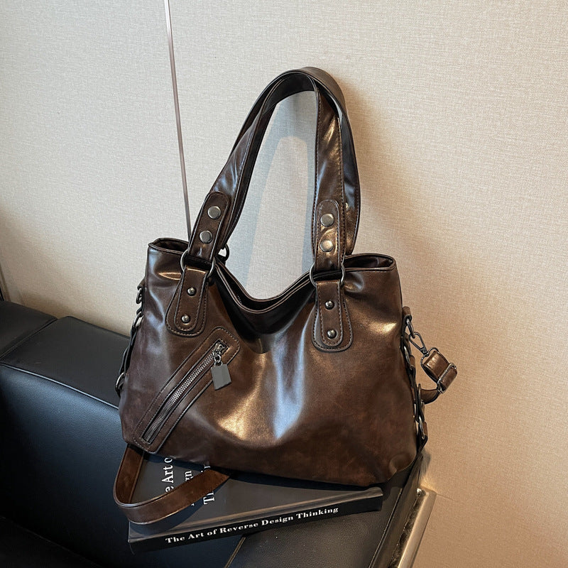 Bolsa de hombro femenina de estilo urbano
