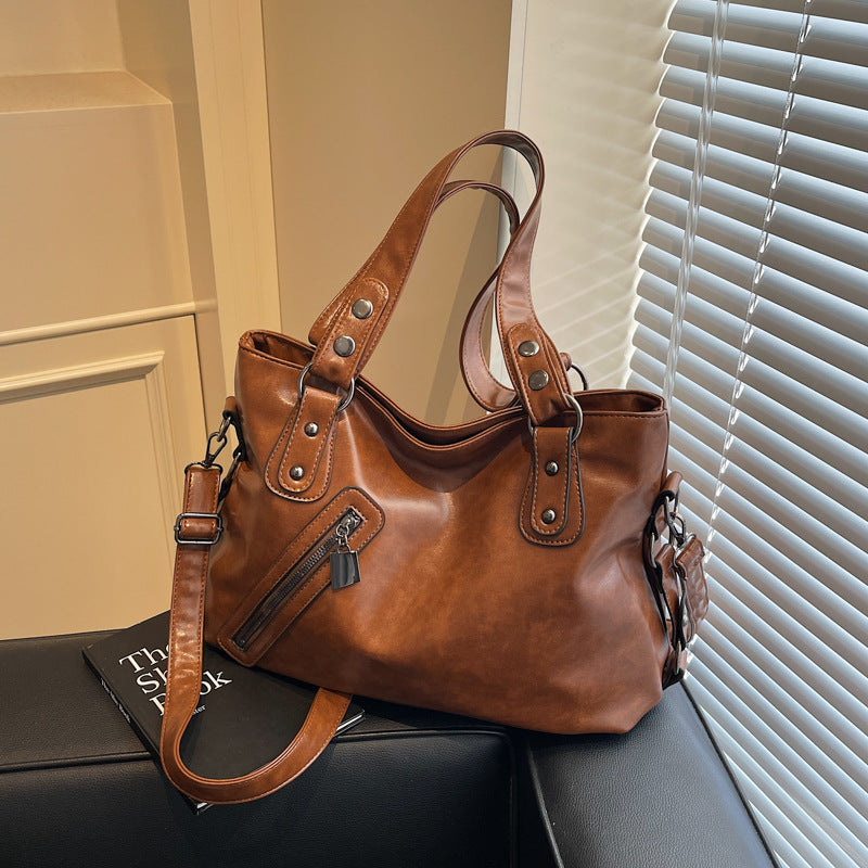 Bolsa de hombro femenina de estilo urbano