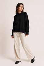 Jersey de mujer oversize con cuello alto corto y bajo asimétrico - Greta