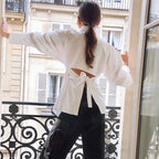 Daisy - Blusa con espalda anudada y detalles recortados
